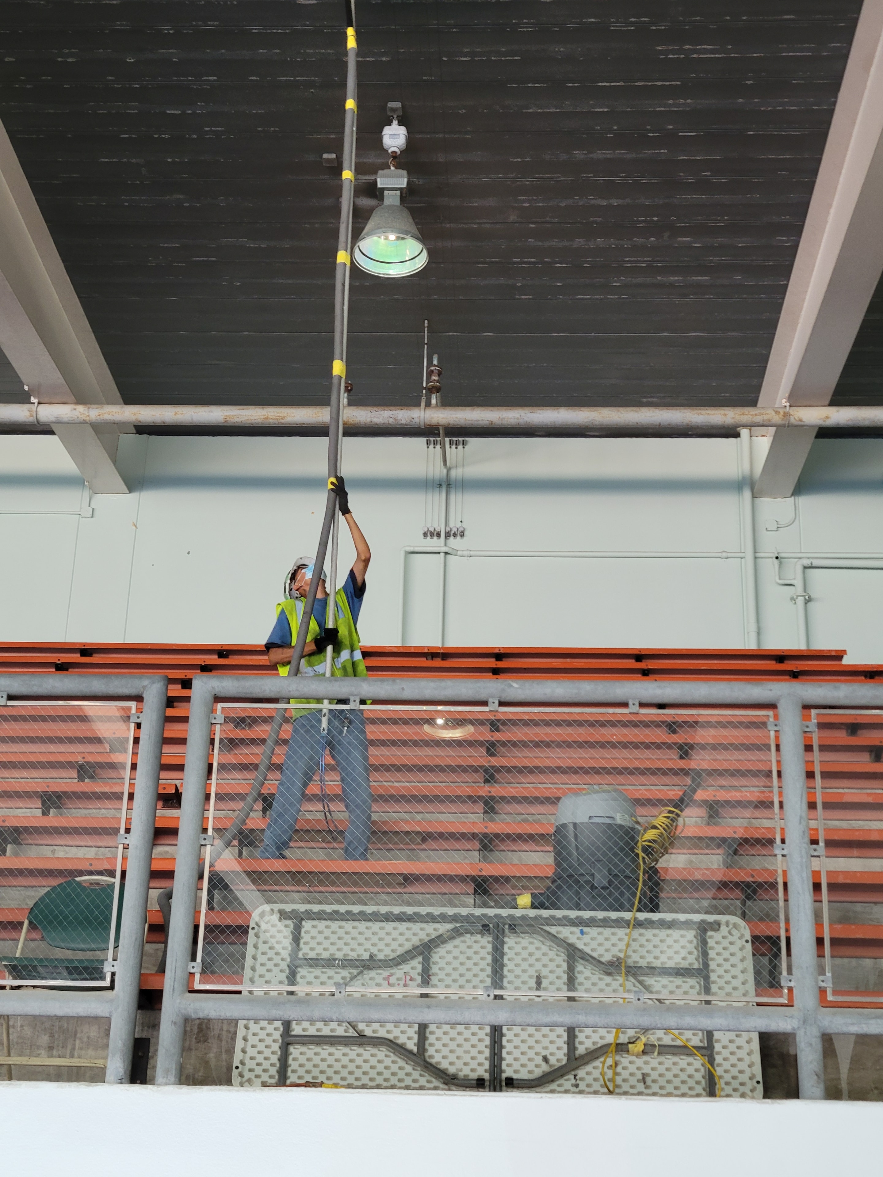 Industrial hygienist conducting air quality testing in a facility